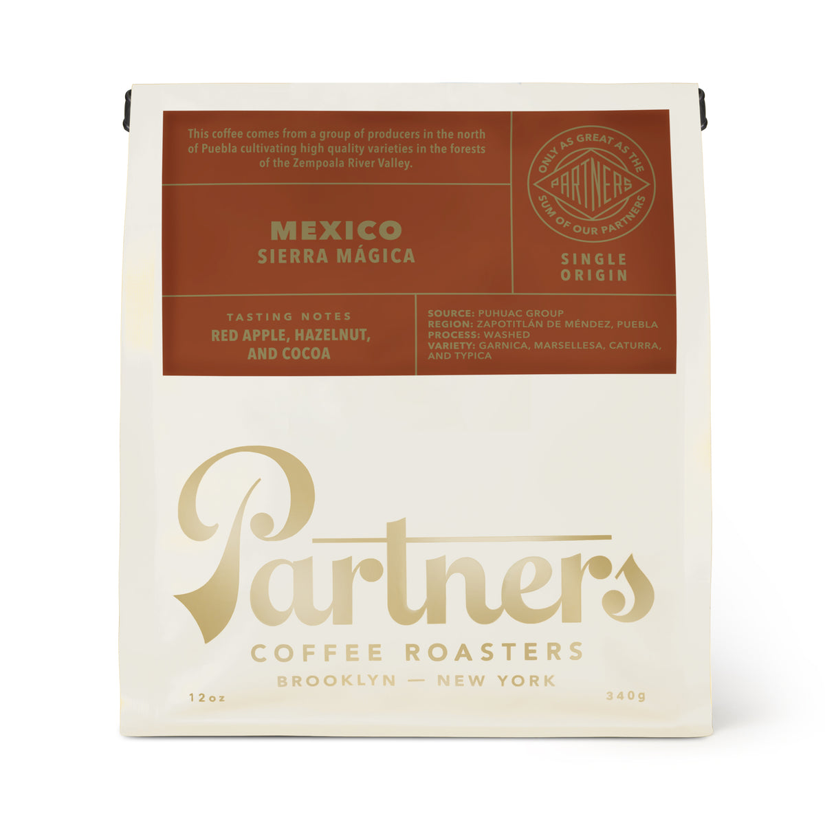 Front view of Mexico Sierra Mágica coffee bag showcasing red apple, hazelnut, and cocoa tasting notes