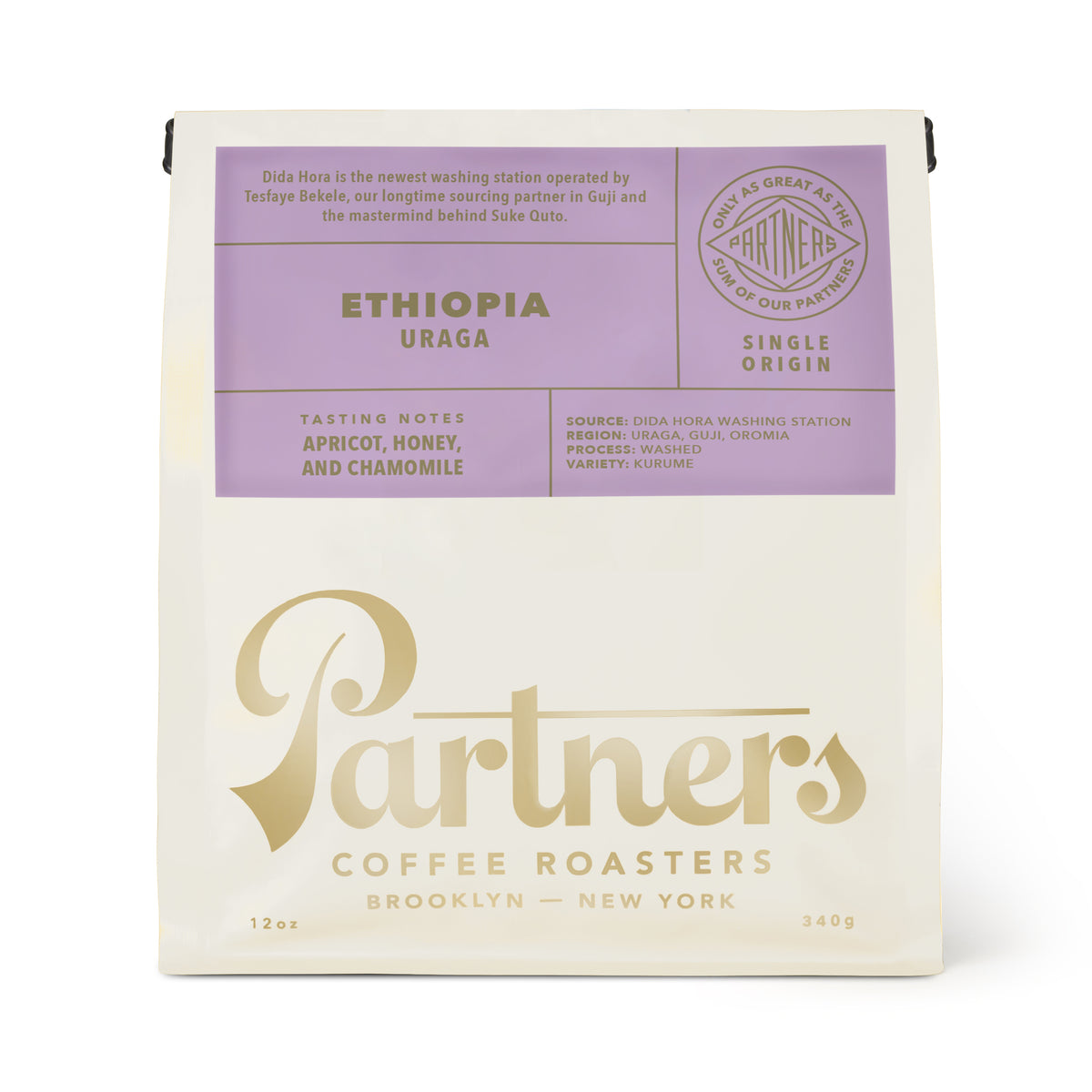 Front view of 12 ounce Ethiopia Uraga coffee bag showcasing apricot, honey, and chamomile tasting notes on a white background