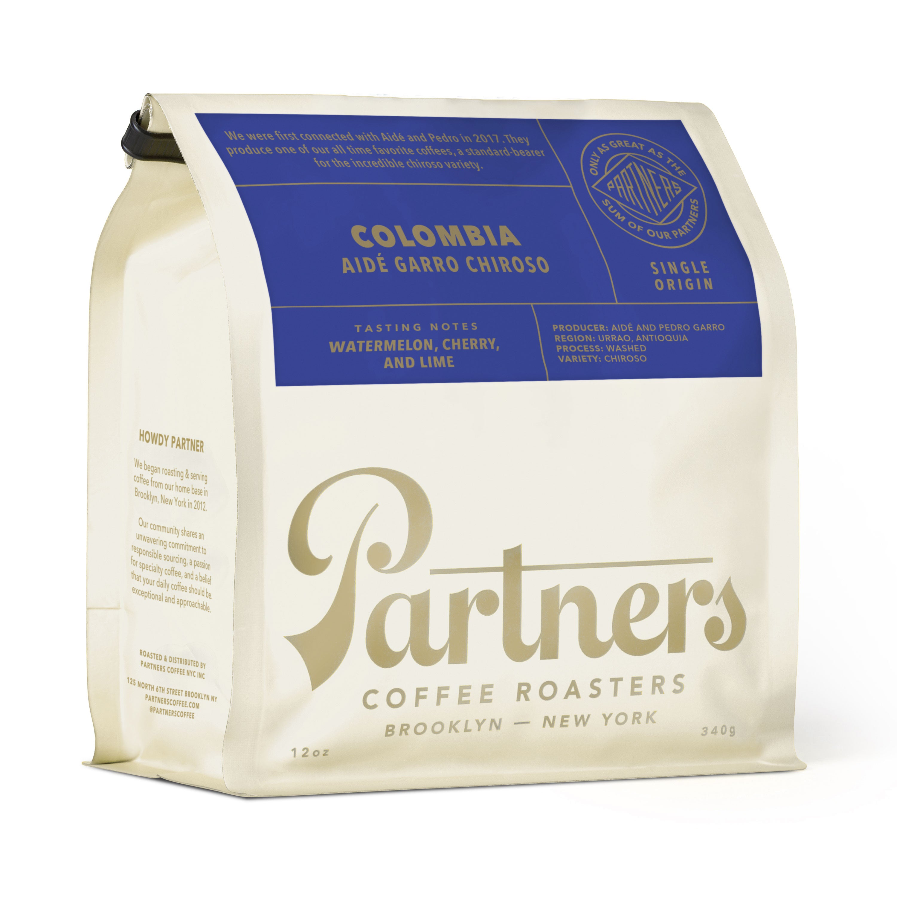 Angled view of Colombia Aidé Garro Chiroso coffee bag showcasing watermelon, cherry, and lime tasting notes with a white background