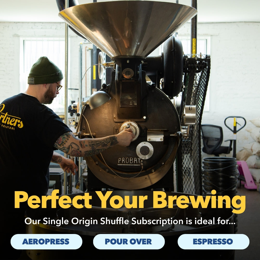Coffee roaster operating a machine with Perfect Your Brewing headline and Aeropress, Pour Over, Espresso options
