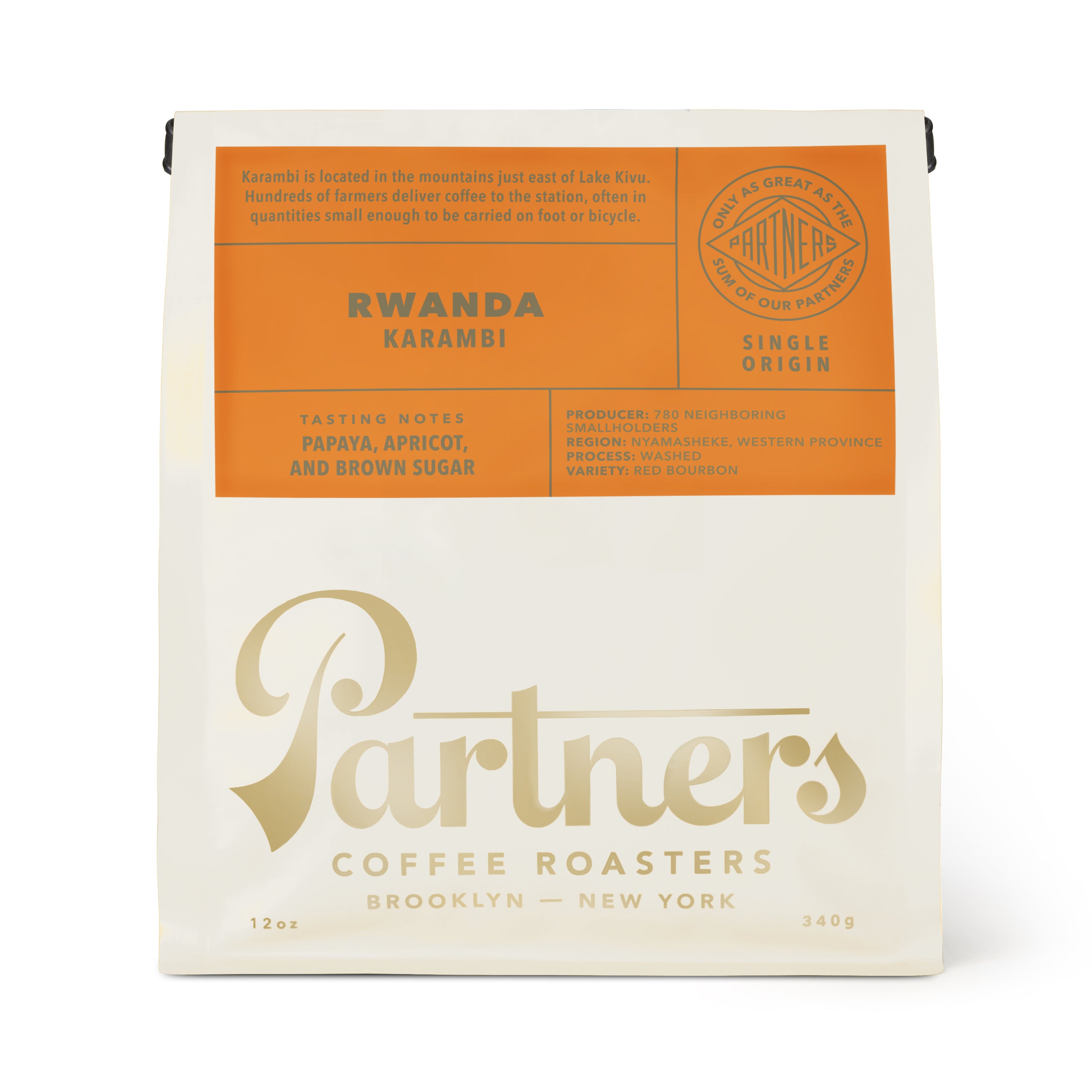 Front view of Rwanda Karambi coffee bag showing 12 oz size, tasting notes, and white packaging on a white background